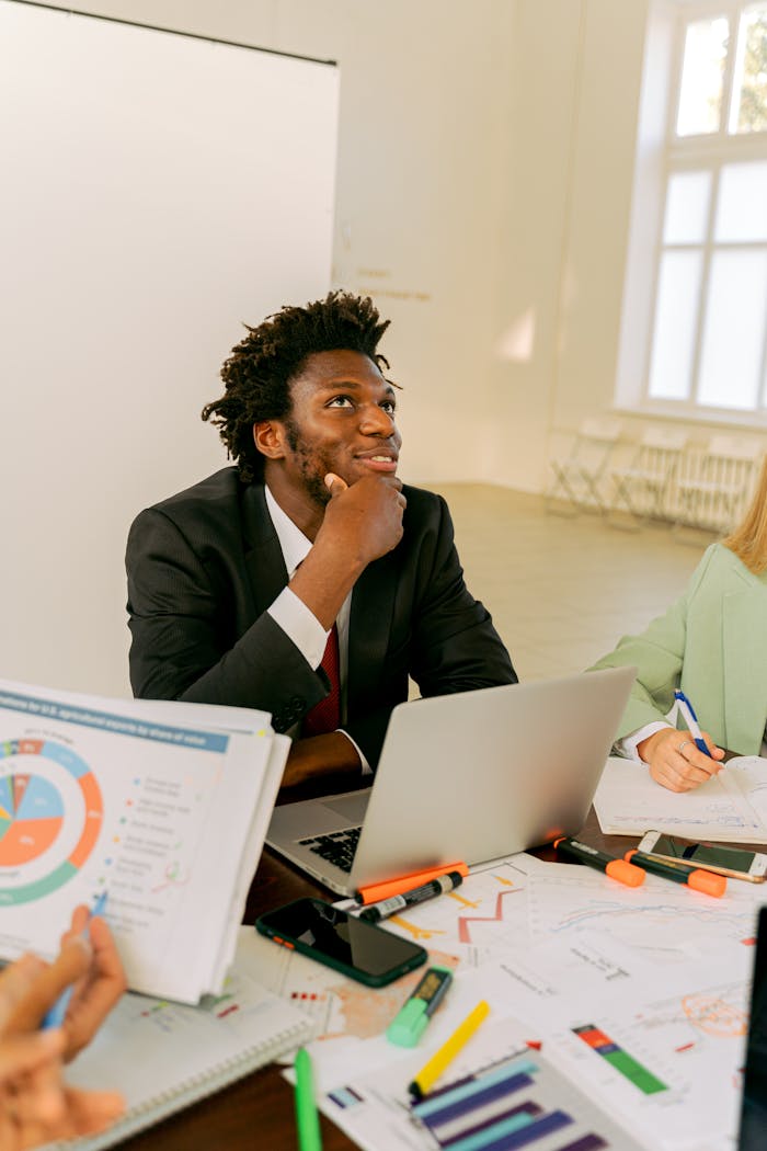 Home Business professional brainstorming in a modern office setting.